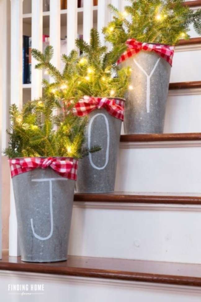 Fill the steps of your house with lighted mini Christmas trees. Fill the steps of your house with lighted mini Christmas trees.