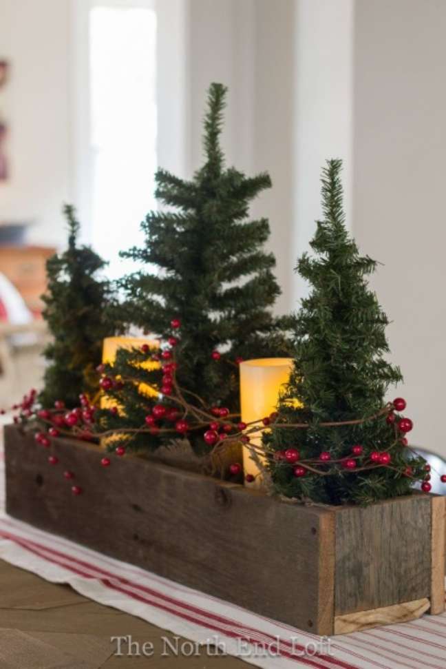 Create your own Christmas table by placing candles and berries around it. Create your own Christmas table by placing candles and berries around it.
