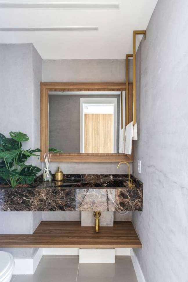 37. Bathroom with brown marble and gold tap – Photo Rubiam Vieira Interiores 37. Bathroom with brown marble and gold tap – Photo Rubiam Vieira Interiores