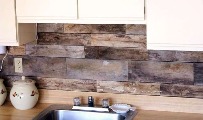 Backsplash - Entrepreneur and antiques dealer Dana of design blog Circa Dee wanted to revamp her old-fashioned kitchen. A few pallets later and she has a super creative backsplash! She cut the planks into 18 inch sections and left the wood raw for maximum weathering effect. Alternatively, you may choose to seal the pallet boards to protect them from moisture. Backsplash - Entrepreneur and antiques dealer Dana of design blog Circa Dee wanted to revamp her old-fashioned kitchen. A few pallets later and she has a super creative backsplash! She cut the planks into 18 inch sections and left the wood raw for maximum weathering effect. Alternatively, you may choose to seal the pallet boards to protect them from moisture.