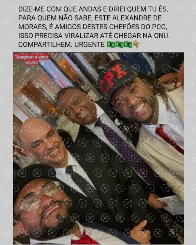 Posts afirmam que l&iacute;deres de movimentos sociais que aparecem em foto com o ministro Alexandre de Moraes s&atilde;o na verdade l&iacute;deres do PCC