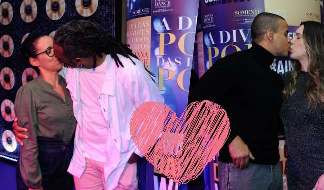 Manoel Soares and Thiago Oliveira, expecting their first daughter, kiss their wives at the premiere