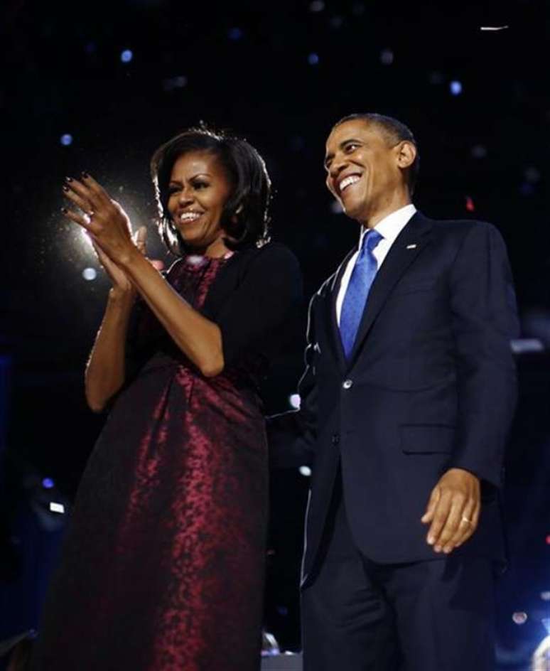 O presidente dos EUA, Barack Obama, e a primeira-dama, Michelle Obama, após o discurso da reeleição, em Chicago. 07/11/2012