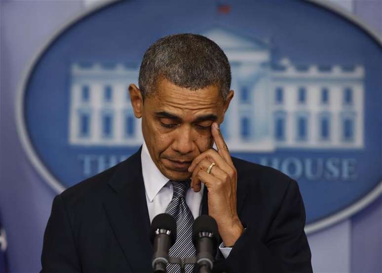 O presidente norte-americano, Barack Obama, faz uma declaração na sala de imprensa da Casa Branca sobre o tiroteio numa escola primária em Connecticut, nesta sexta-feira, em Washington, nos Estados Unidos. 14/12/2012