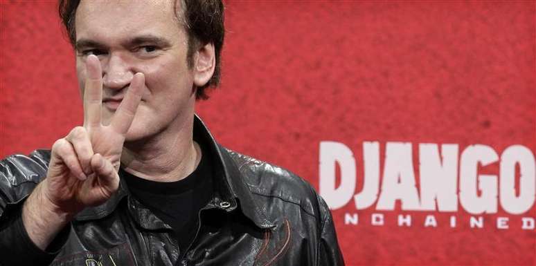 Cineasta norte-americano Quentin Tarantino é visto durante estréia alemã do filme "Django", em Berlim. A piada começa no batismo do protagonista. Parece altamente improvável que um escravo negro na América do século 19 se chamasse "Django", nome que batiza heróis dos faroestes-espaguete que, entre vários outros, foram ingredientes básicos da eclética formação de Tarantino. 08/01/2013
