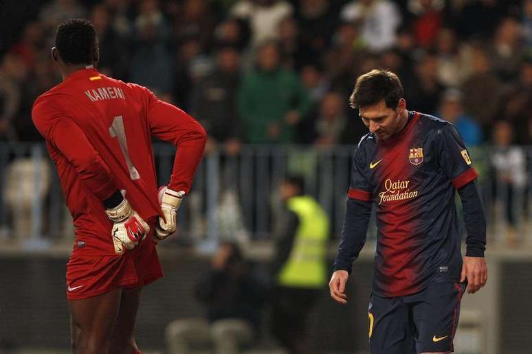 Lionel Messi, do Barcelona, reage em partida no estádio de La Rosaleda em Málaga, na Espanha. Messi voltou a treinar normalmente e estará à disposição para a partida em casa contra o Osasuna pelo campeonato espanhol, disse o clube no sábado. 24/01/2013.