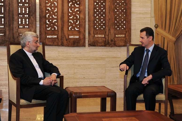 Fotografia divulgada pela agência síria mostra Jalili em encontro com Assad em Damasco