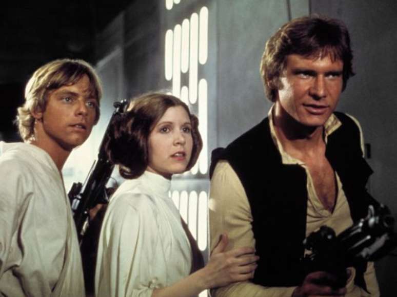 <p>Harrison Ford (à direita) na pele de Han Solo na primeira trilogia da franquia. </p>