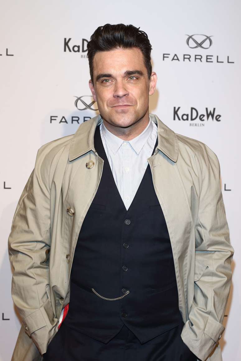 <p>O cantor Robbie Williams seria um grande consumidor de cafeína</p>