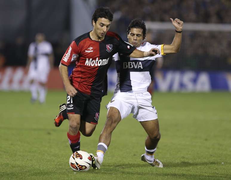 <p>Eliminado nas semifinais, Scocco (à esq.) é um dos artilheiros da Libertadores, com seis gols</p>