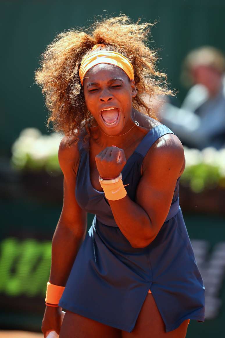 Serena Williams grita para comemorar ponto contra Svetlana Kuznetsova