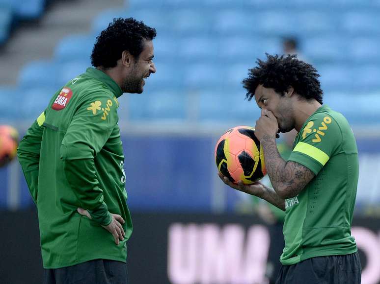 <p>Marcelo (à dir.) é uma das dúvidas de Felipão na Seleção Brasileira</p>