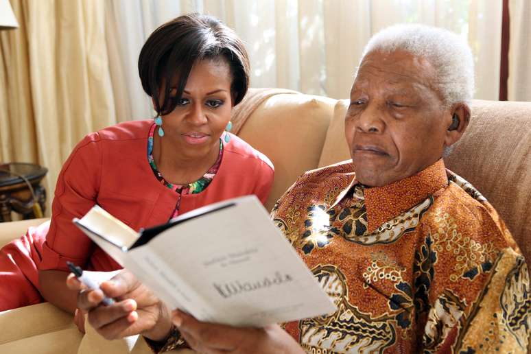 Michelle Obama e Mandela, em encontro em 2011