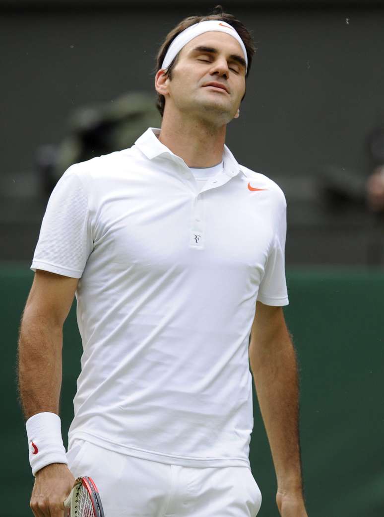 Heptacampeão de Wimbledon, Roger Federer deu adeus na segunda rodada da edição 2013