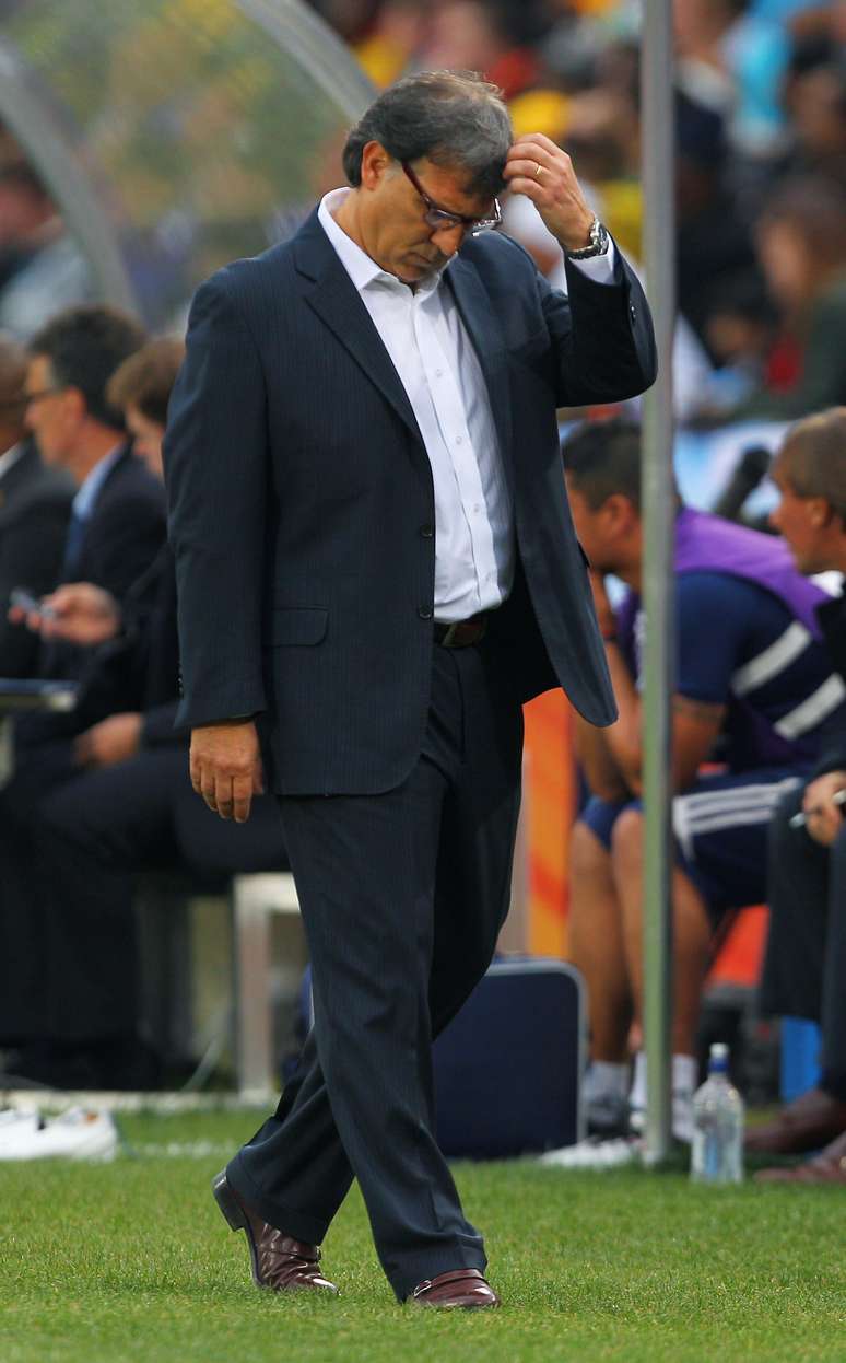 <p>Na Copa de 2010, Martino optou pelo visual mais elegante</p>