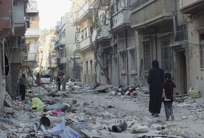 Cidade de Homs é um dos principais palcos do conflito sírio e foi devastada