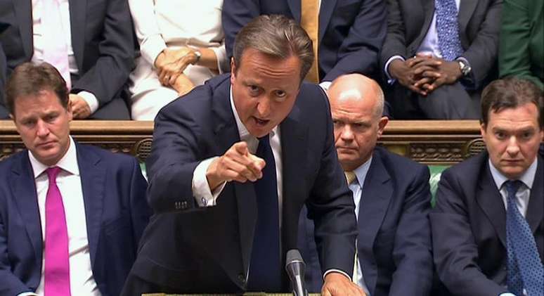 <p>David Cameron discursa na Câmara dos Comuns: derrota da proposta intervencionista do governo</p>