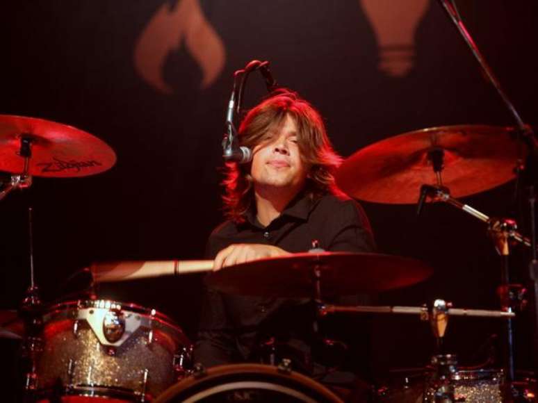 Mais jovem dos irmãos Hanson durante show do trio em São Paulo no último mês de julho