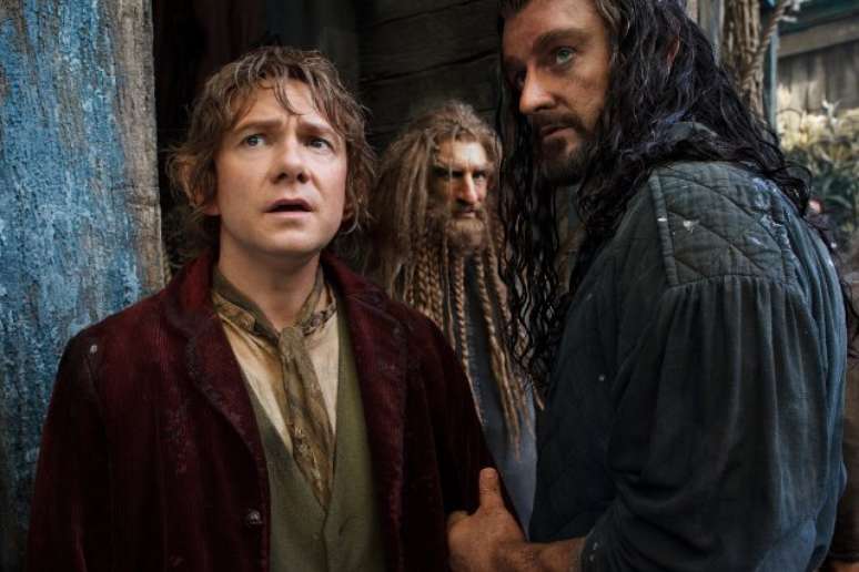<p>A aguardada sequ&ecirc;ncia de 'O Hobbit: Uma Jornada Inesperada' (2012) chega aos cinemas do Brasil nesta sexta-feira (13). Dirigido por Peter Jackson e estrelado por Martin Freeman, 'O Hobbit: A Desola&ccedil;&atilde;o de Smaug' narra mais aventuras de Bilbo Baggins e ainda tem no elenco Elijah Wood, Cate Blanchett, Ian McKellen</p>