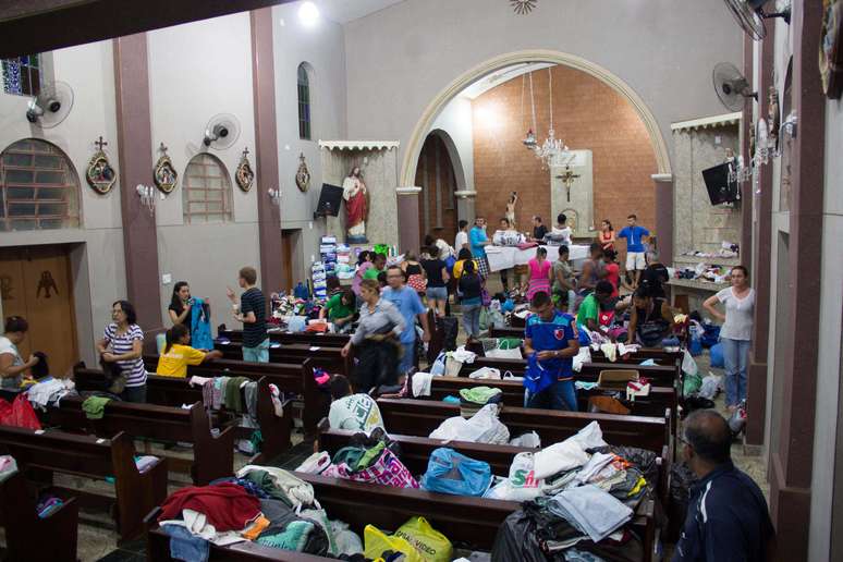 Moradores levaram doações para a paróquia de São Sebastião no centro de Austin