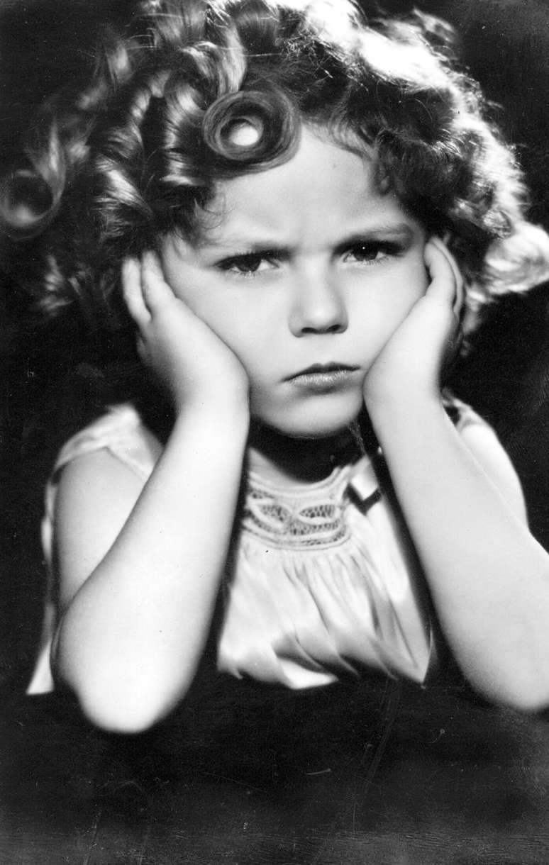 <p>Shirley Temple morreu nessa segunda-feira (10), nos Estados Unidos. Ela foi a mais famosa estrela infantil de todos os tempos. Na foto, a atriz em 1936</p>