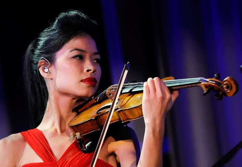 <p>Vanessa-Mae, que tem os passaportes brit&acirc;nico e tailand&ecirc;s, &eacute; uma violinista de destaque internacional</p>