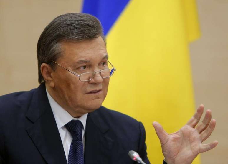 <p>Presidente deposto da Ucrânia Viktor Yanukovich durante coletiva de imprensa na cidade de Rostov-on-Don, no sul da Rússia. Yanukovich, em sua primeira aparição em público desde que foi deposto do cargo de presidente da Ucrânia, disse nesta sexta-feira, 28, na Rússia que não vai desistir de lutar pelo futuro de seu país</p>