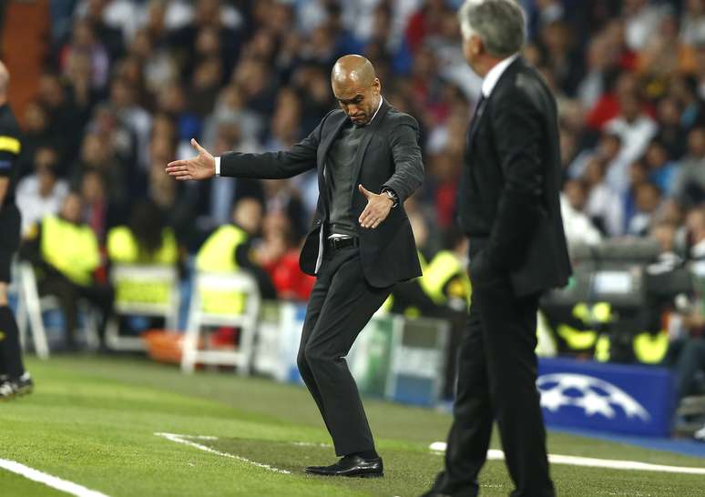 <p>Pep Guardiola "se remexeu", mas, agora no Bayern, perdeu a sua primeira partida como treinador no Santiago Bernabéu</p>