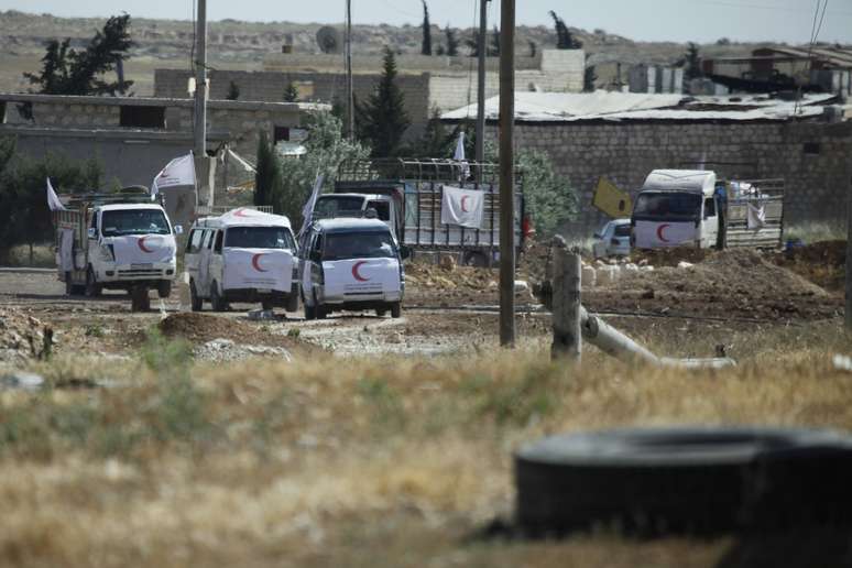 Veículos estacionados em frente à prisão de Allepo; quase 850 já foram mortos pelo regime somente em 2014