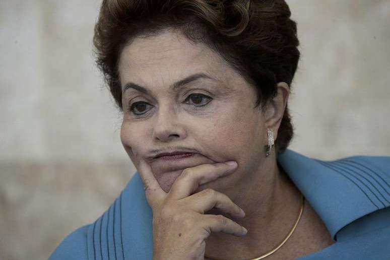 Presidente Dilma Rousseff acompanha reunião do Conselho de Desenvolvimento Econômico e Social (CDES) no Palácio do Planalto, em Brasília, nesta quinta-feira, 5 de junho.