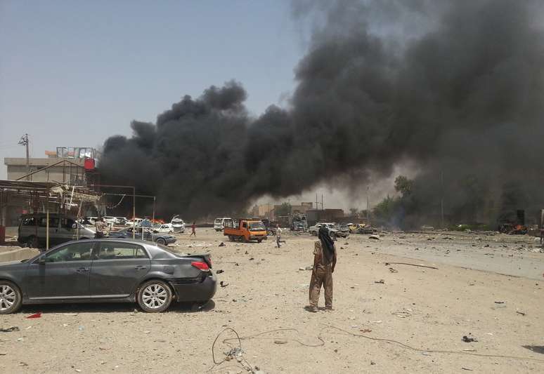 <p>Ao menos 24 pessoas morreram após um ataque com carro-bomba na cidade de Tuz Khurmato, no norte da capital, Bagdá, em 9 de junho </p>