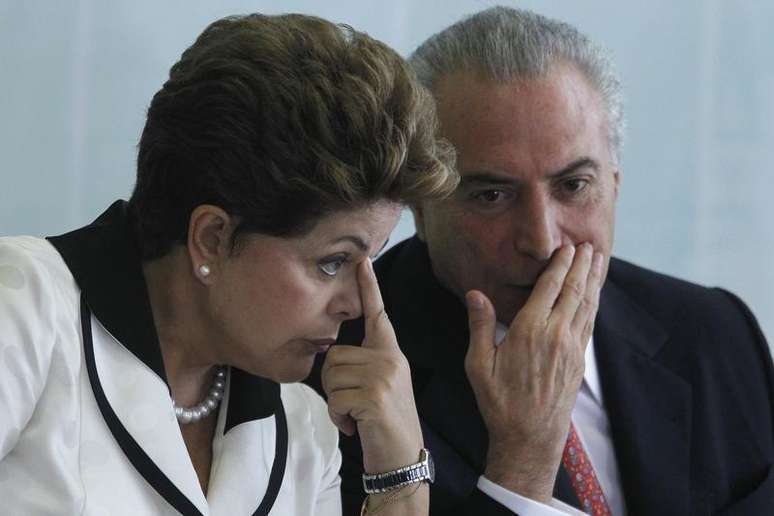 O vice-presidente Michel Temer e a presidente Dilma Rousseff participam de um evento no Palácio do Planalto, em Brasília, em 2012. 03/04/2012