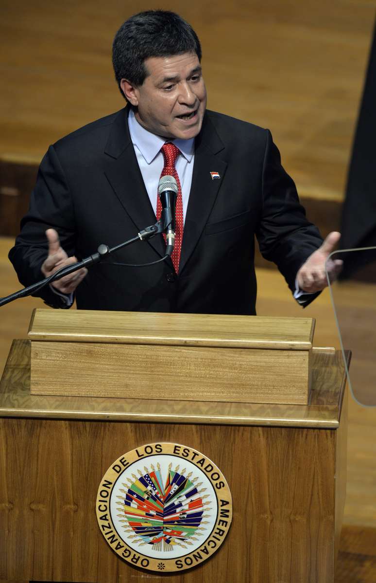 <p>Presidente do Paraguai, Horacio Cartes fala durante a inaugura&ccedil;&atilde;o da 44&ordf; Assembl&eacute;ia Geral da OEA, em Assun&ccedil;&atilde;o, em 3 de junho</p>