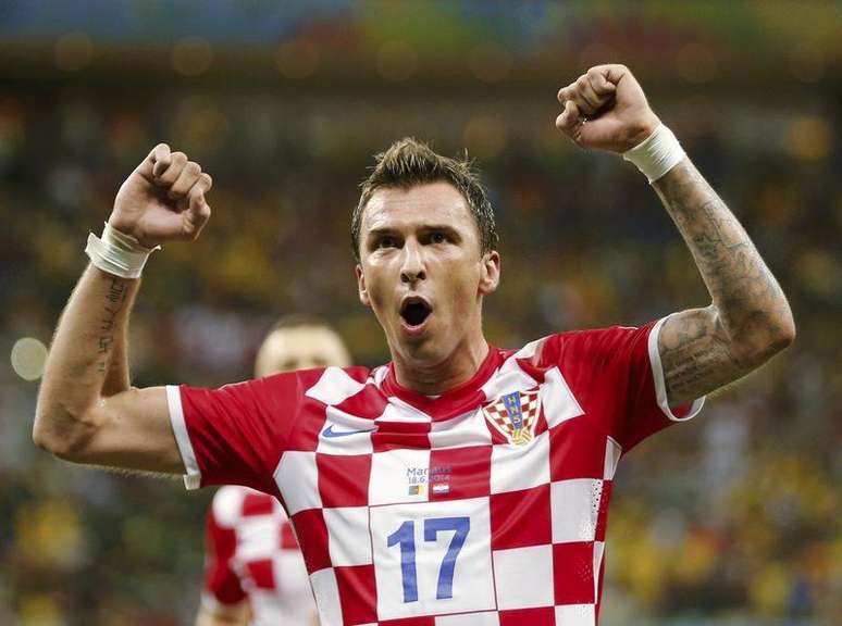 Jogador croata Mario Mandzukic celebra gol contra Camarões na Arena Amazônia, em Manaus. 18/6/2014