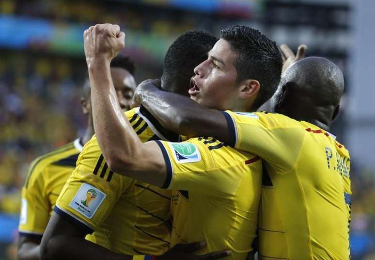 <p>Jogadores da Colômbia comemoram gol marcado contra o Japão em Cuiabá; chave brasileira tem quatro sul-americanos por uma vaga na semi  </p>
