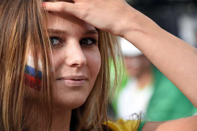 <p>Torcidas de Argélia e Rússia mostram empolgação na chegada à Arena da Baixada, em Curitiba para assistir ao jogo entre as duas seleções; partida é válida pelo Grupo H</p>