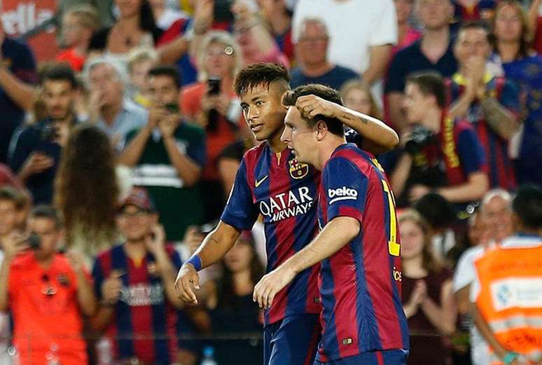 Messi comemora gol com Neymar contra time mexicano León durante jogo no Camp Nou, em Barcelona. 18/8/2014.