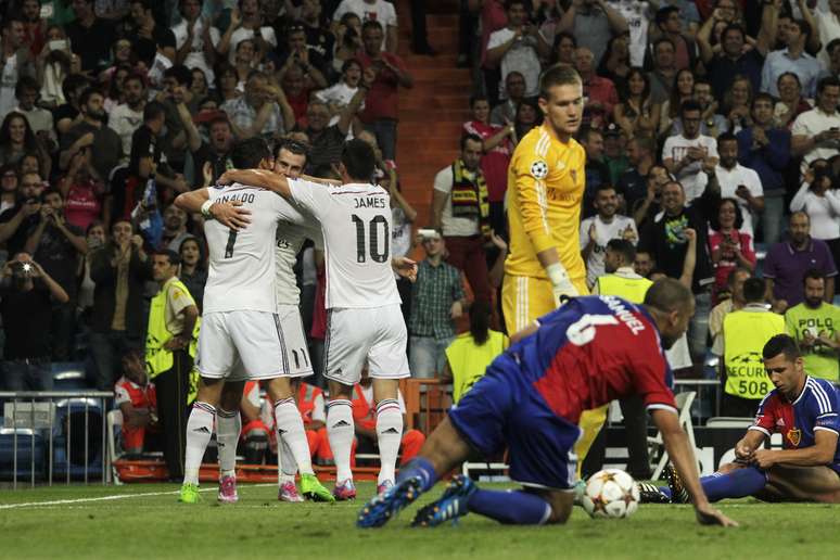 <p>Jogadores do Real Madrid festejam goleada sobre o Basel; confira imagens da rodada da Liga dos Campeões.</p>