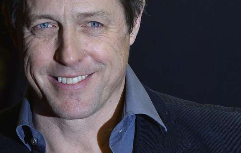 O ator britânico Hugh Grant chega para um evento no centro de Londres, na Inglaterra, em fevereiro. 18/02/2013