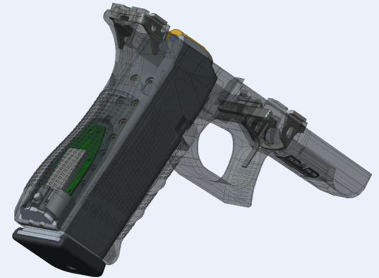 Chip da YardArm é mostrado em verde na coronha de uma pistola Glock 9 mm