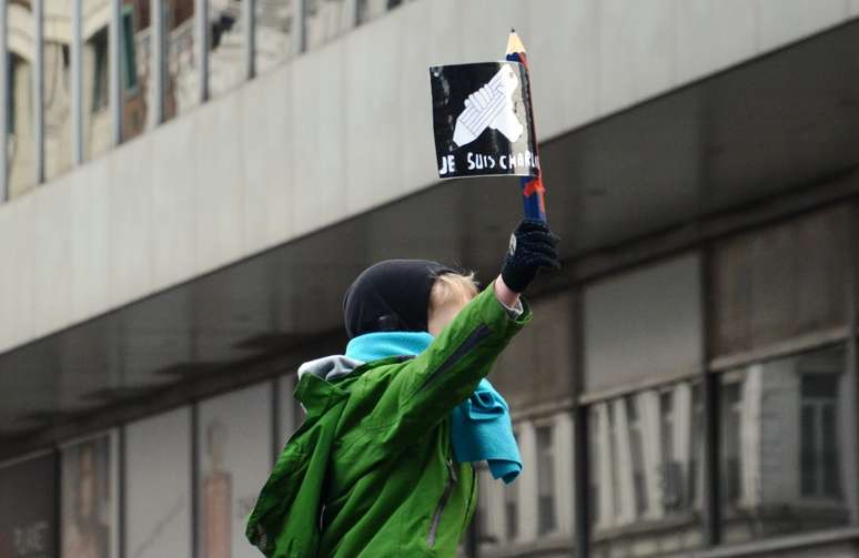 Criança belga participa de marcha