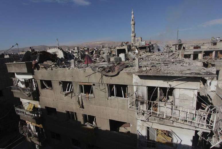 <p>Vista geral da destruição após os ataques aéreos por forças sírias</p>