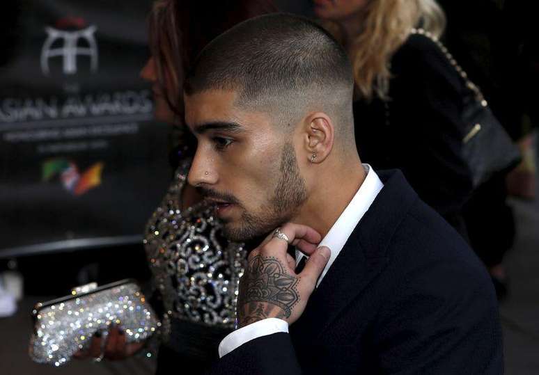 Ex-membro do One Direction Zayn Malik em tapete vermelho de evento em Londres. 17/04/2015