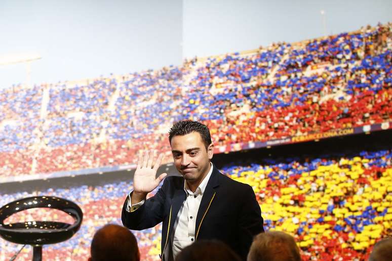 Xavi completou 24 anos de Barcelona