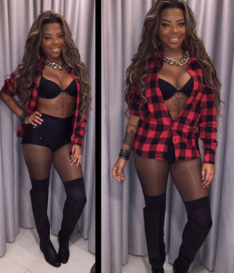 Ludmilla apostou em hot pants, meia-calça 7/8, bota de cano longuíssimo e camisa xadrez, que deixava sutiã e tatuagem á mostra, para show