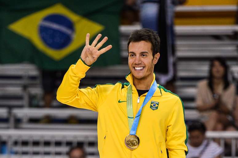 Tetracampeão pan-americano, Marcel comemora o ouro fazendo o número quatro