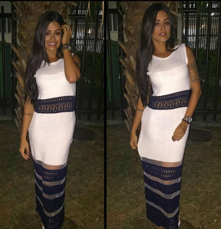 Aline Riscado optou por um vestido bicolor, com faixas na cintura e na barra a partir das coxas. O efeito não favorece nenhuma mulher, nem ela, porque corta a silhueta