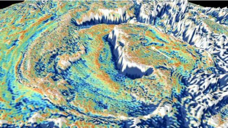 No modelo que exacerba as anomalias da gravidade no Golfo do México, a seta branca indica a área da cratera de Chicxulub