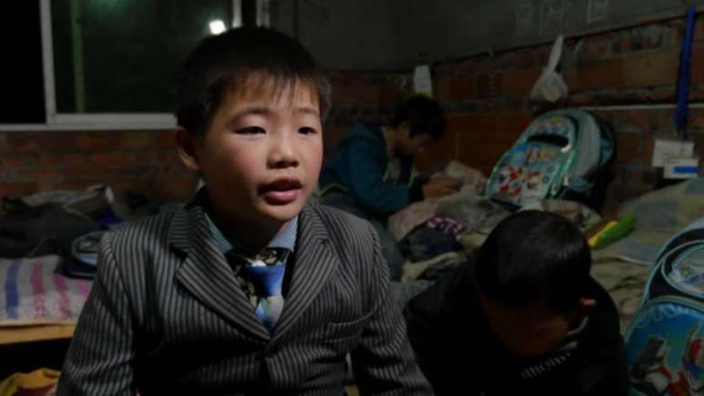 'Não quero viver separados dos meus pais", diz Tan Yuwen, de 11 anos