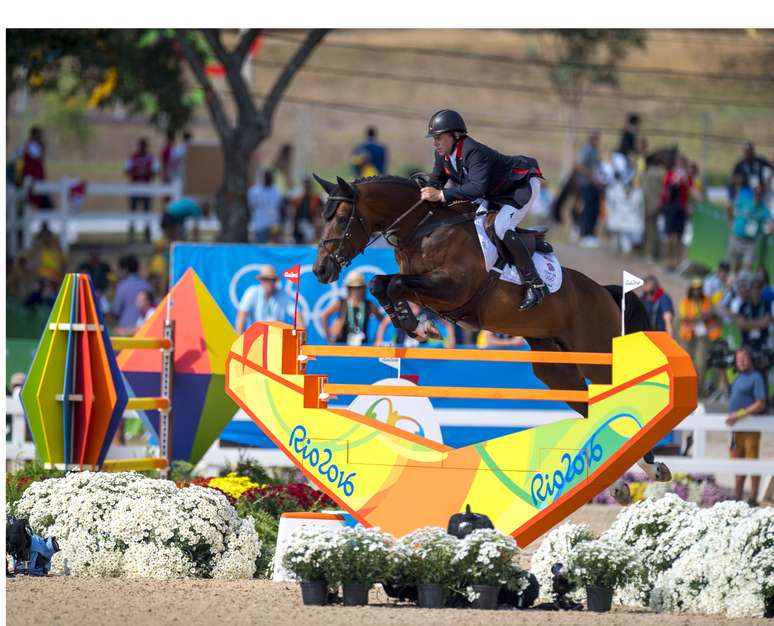 Nick Skelton e seu cavalo Big Star, medalhista de ouro no salto individual